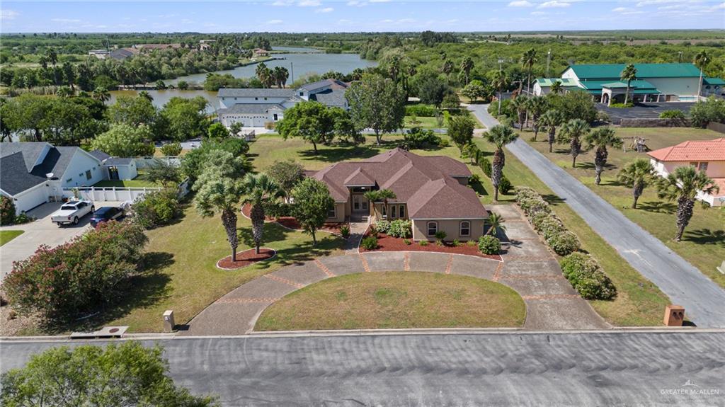 112 Madelyn Rose Bayview, TX 78566 - Photo 35 of 41 an aerial view of a house with a yard basket ball court and outdoor seating
