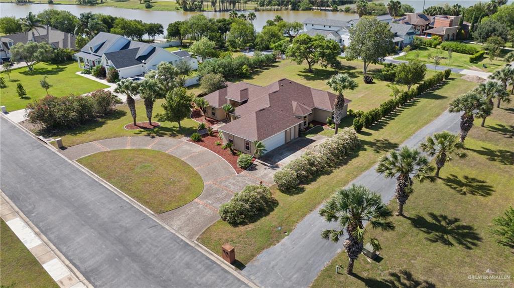 112 Madelyn Rose Bayview, TX 78566 - Photo 36 of 41 an aerial view of a house with a swimming pool and outdoor seating