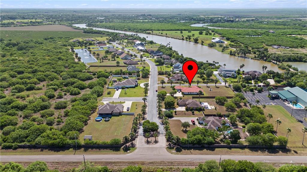 112 Madelyn Rose Bayview, TX 78566 - Photo 41 of 41 an aerial view of lake and residential houses with outdoor space