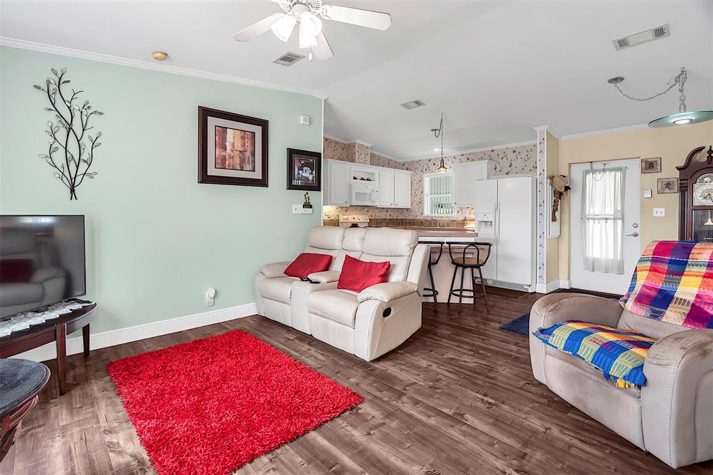 809 Putter Place Pompano Beach, FL 33069 - Photo 16 of 51 a living room with furniture and flat screen tv