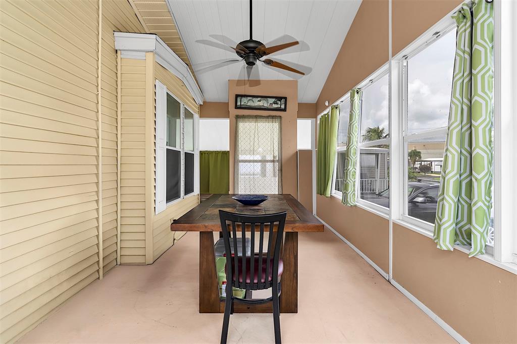 809 Putter Place Pompano Beach, FL 33069 - Photo 22 of 51 a view of a porch with furniture