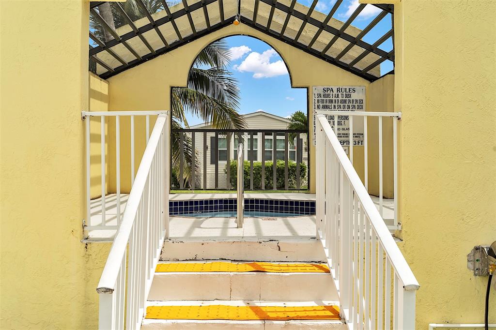 809 Putter Place Pompano Beach, FL 33069 - Photo 47 of 51 a view of swimming pool