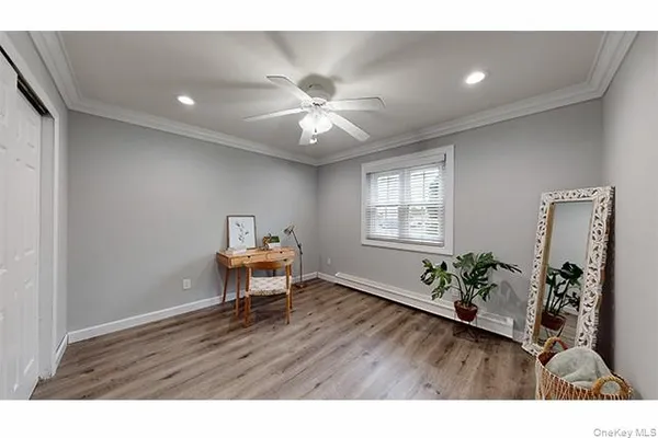 a workspace with furniture and window