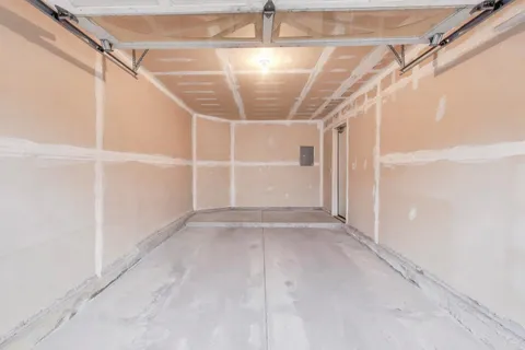 a view of a room with white walls
