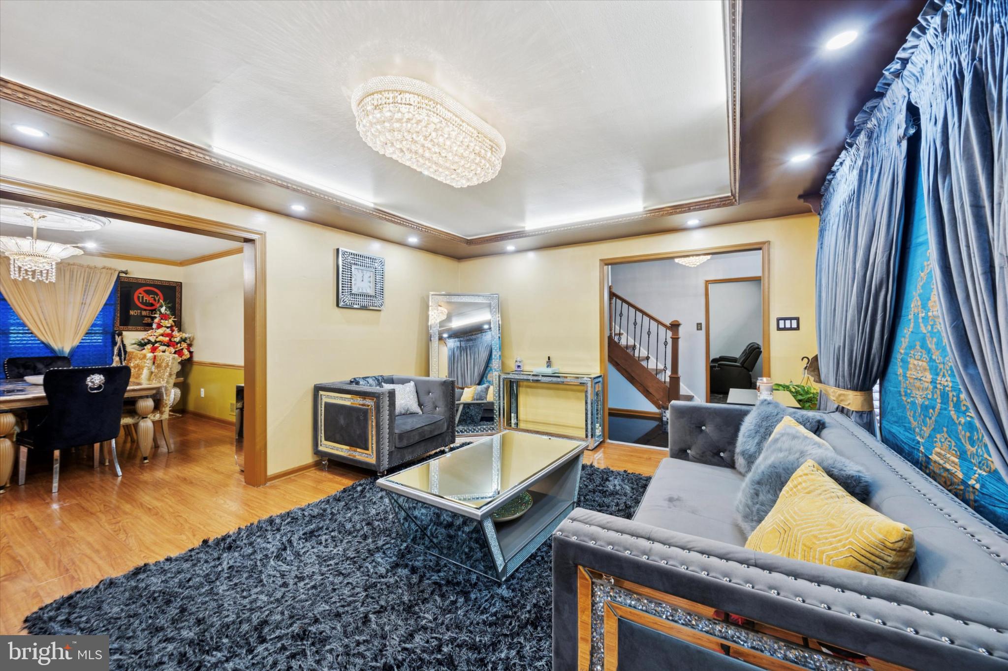 506 Flora Circle Springfield, PA 19064 - Photo 13 of 35 a living room with furniture wooden floor and a table