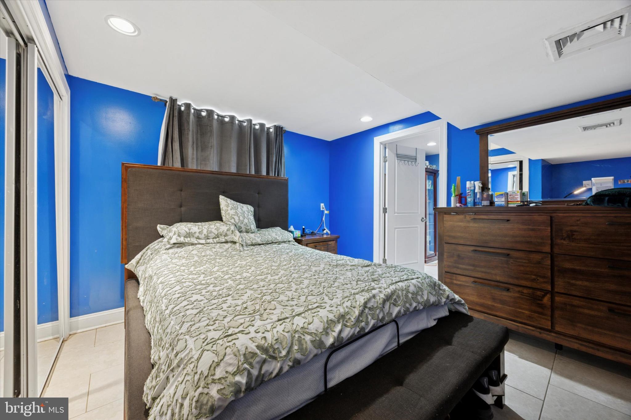 506 Flora Circle Springfield, PA 19064 - Photo 32 of 35 a bedroom with a bed and a dresser