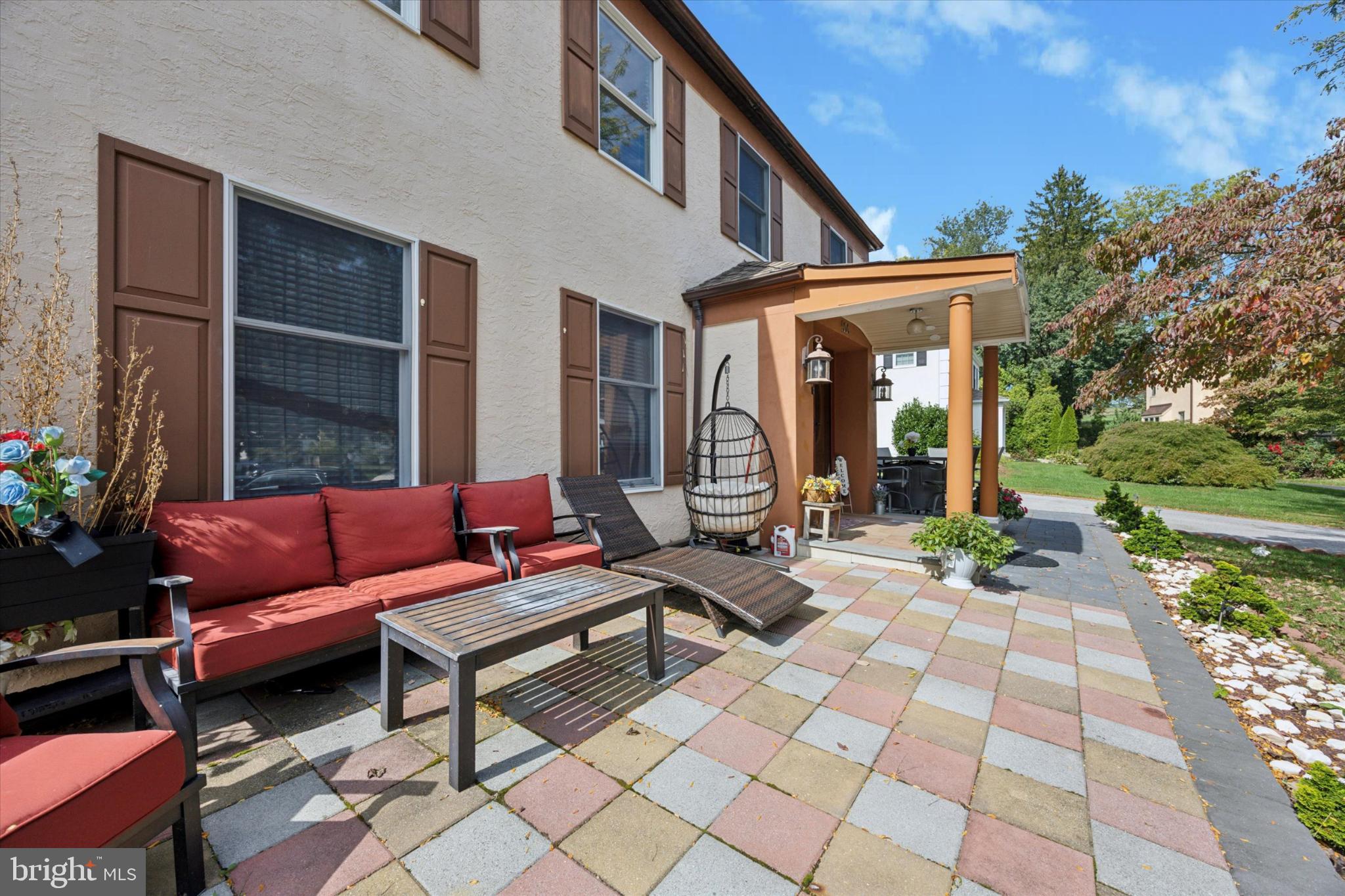 506 Flora Circle Springfield, PA 19064 - Photo 4 of 35 a backyard of a house with outdoor seating