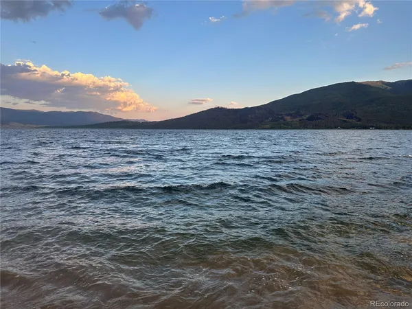 a view of a lake with a mountain in the background