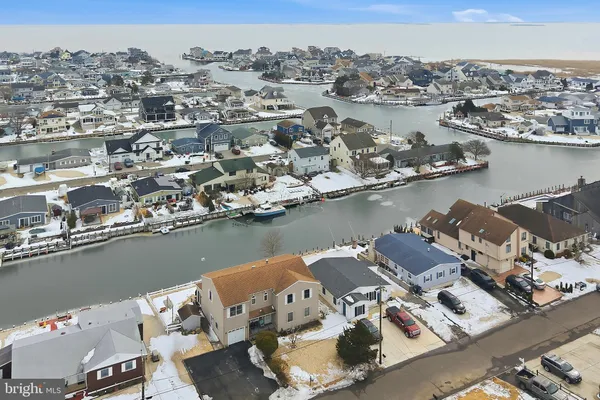 an aerial view of a houses with outdoor space