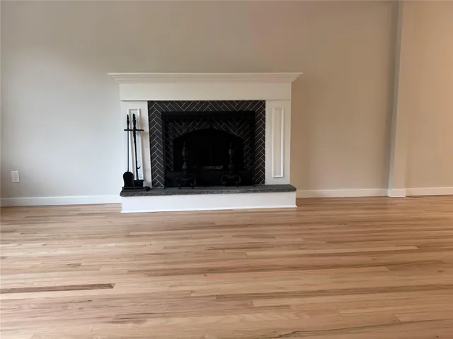 a living room with a fireplace