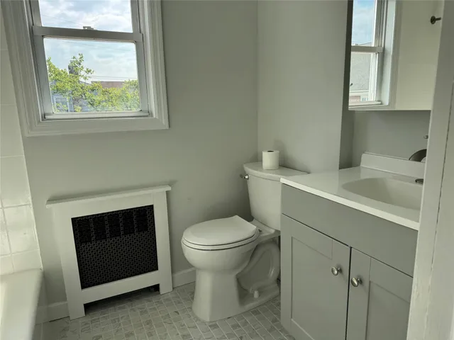 a view of house with backyard