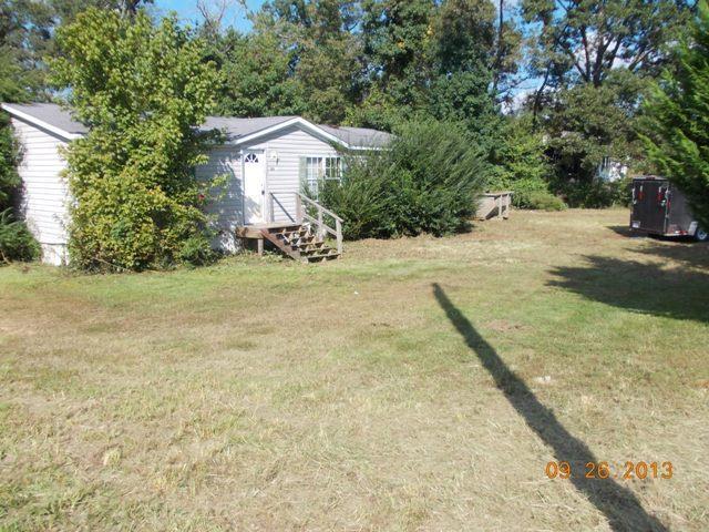 293 Ridgeview Lane Chatsworth, GA 30705 - Photo 1 of 1 a view of a house with a yard and large tree