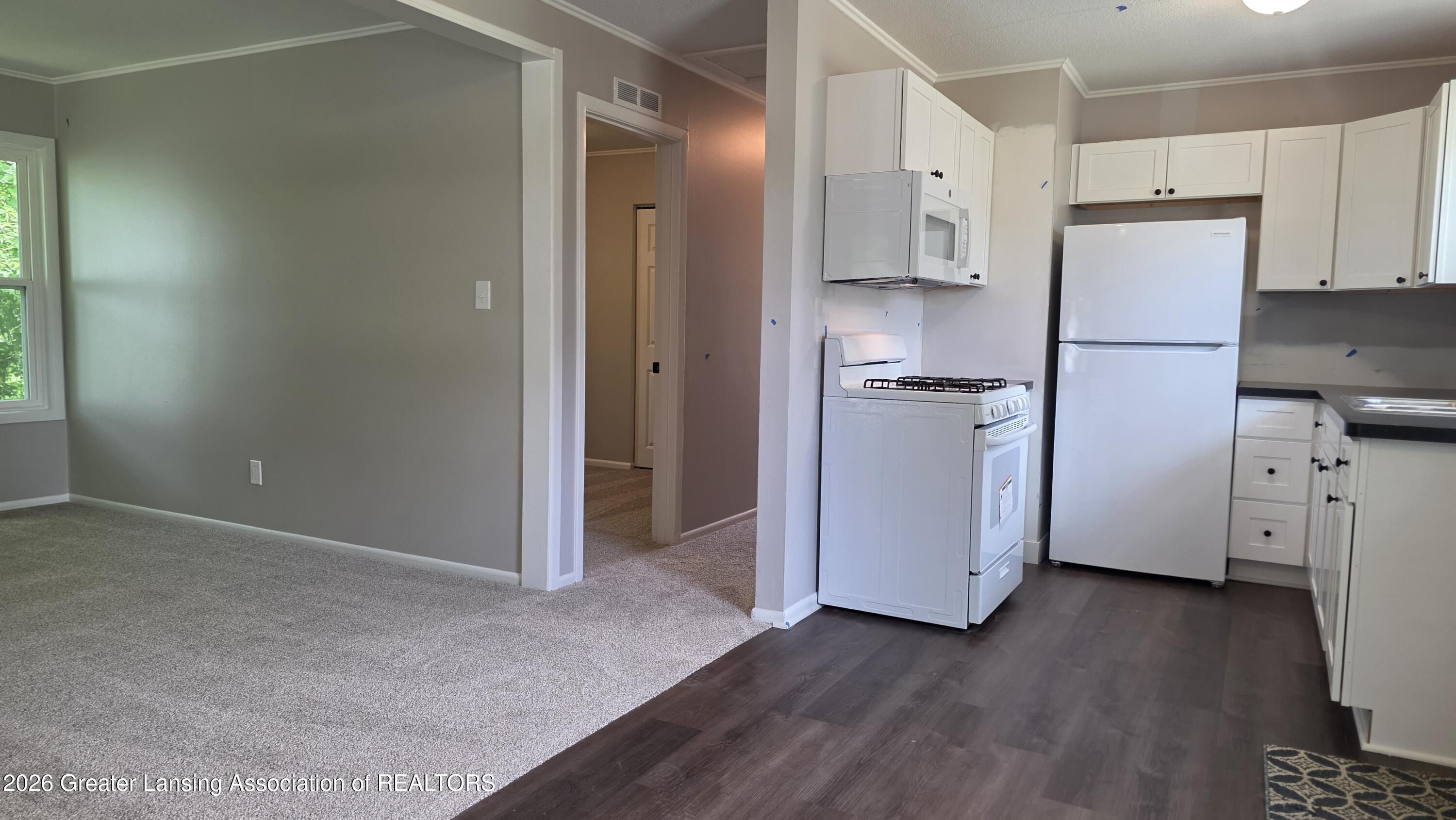 825 Dunlap Street Lansing, MI 48910 - Photo 9 of 32 20260526_145945
