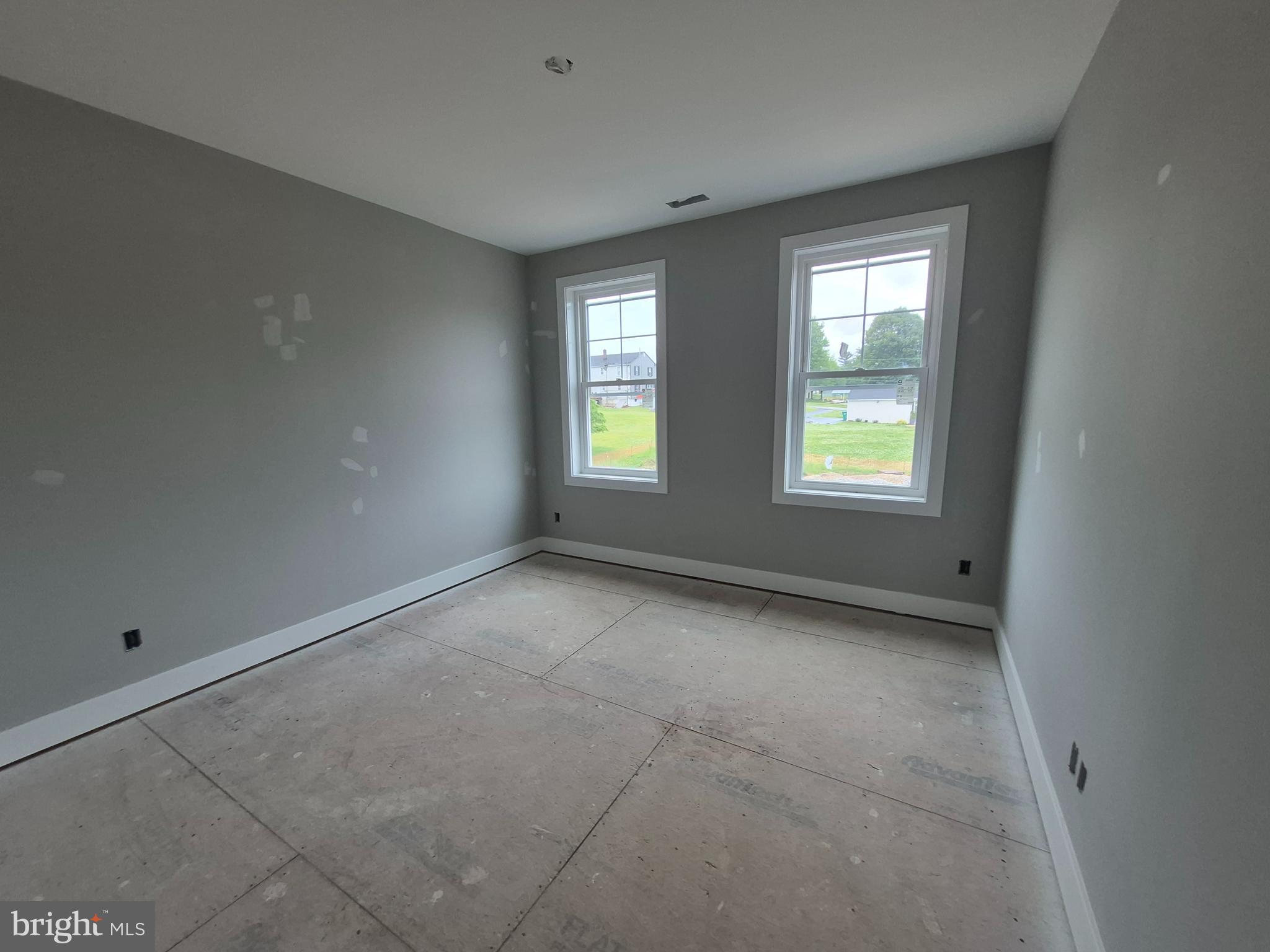 324 Bishop Hollow Road Newtown Square, PA 19073 - Photo 22 of 37 an empty room with windows
