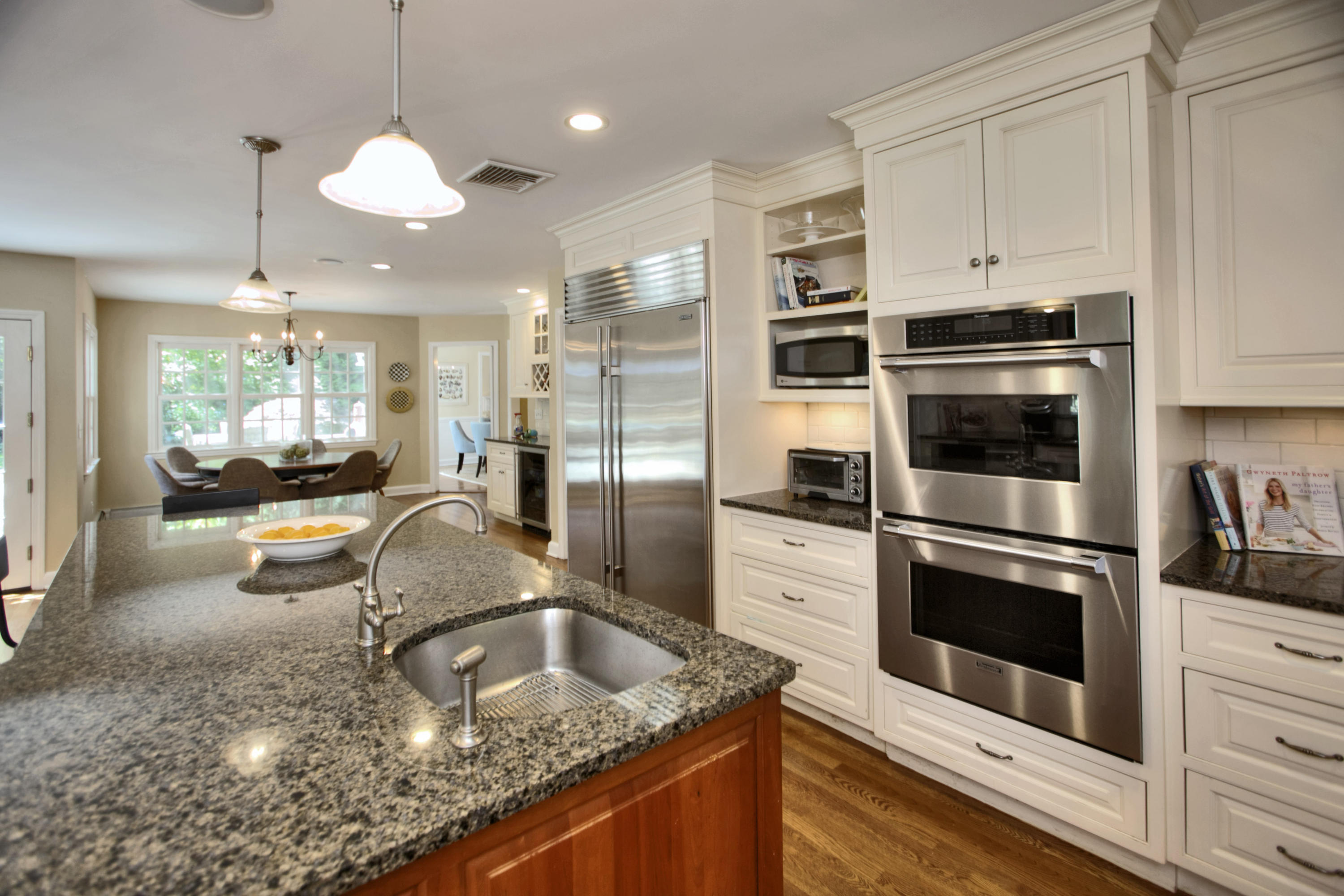 17 Rocaton Road Darien, CT 06820 - Photo 11 of 26 a kitchen with stainless steel appliances granite countertop a sink a stove and a refrigerator