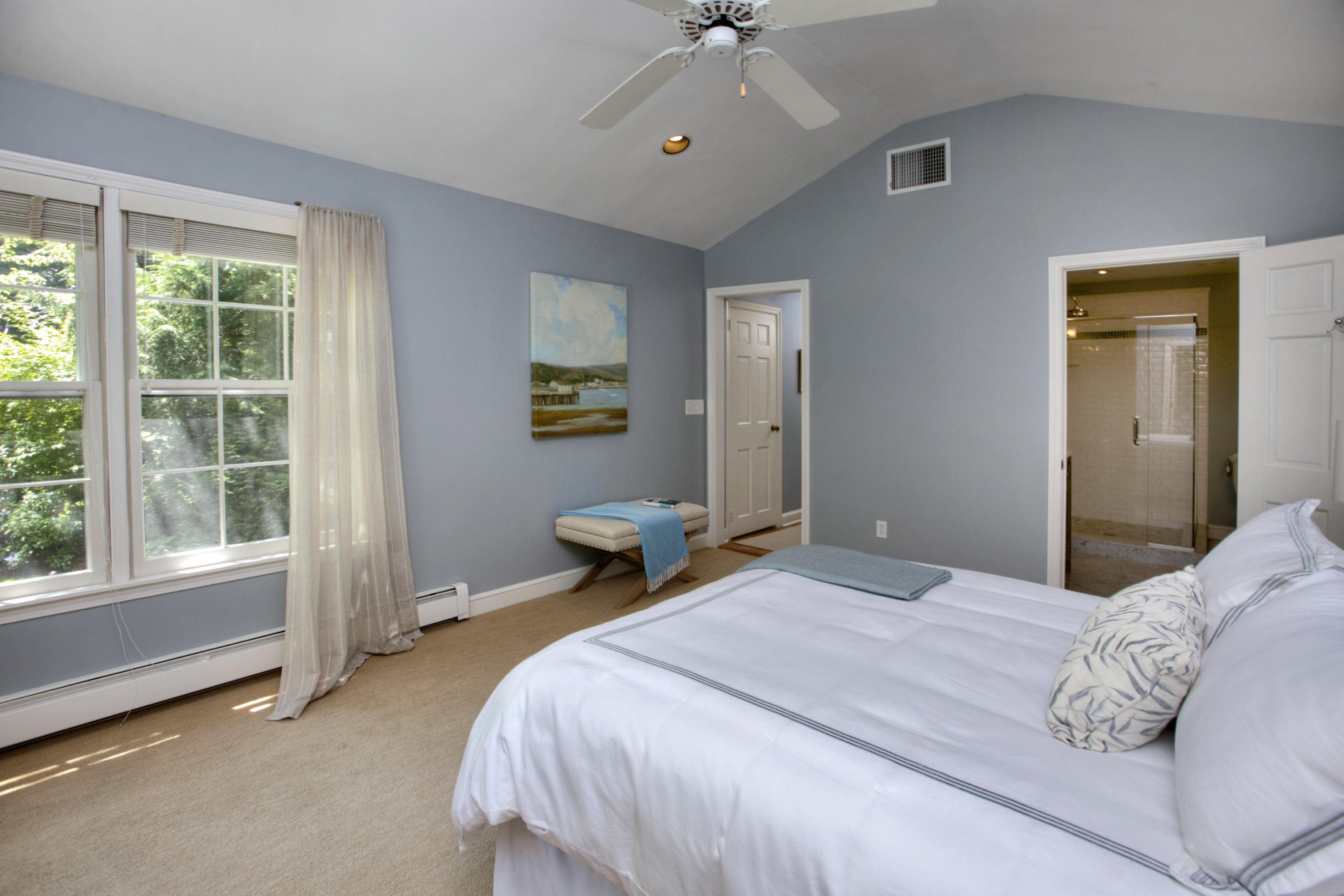 17 Rocaton Road Darien, CT 06820 - Photo 17 of 26 a bedroom with a large bed and a window