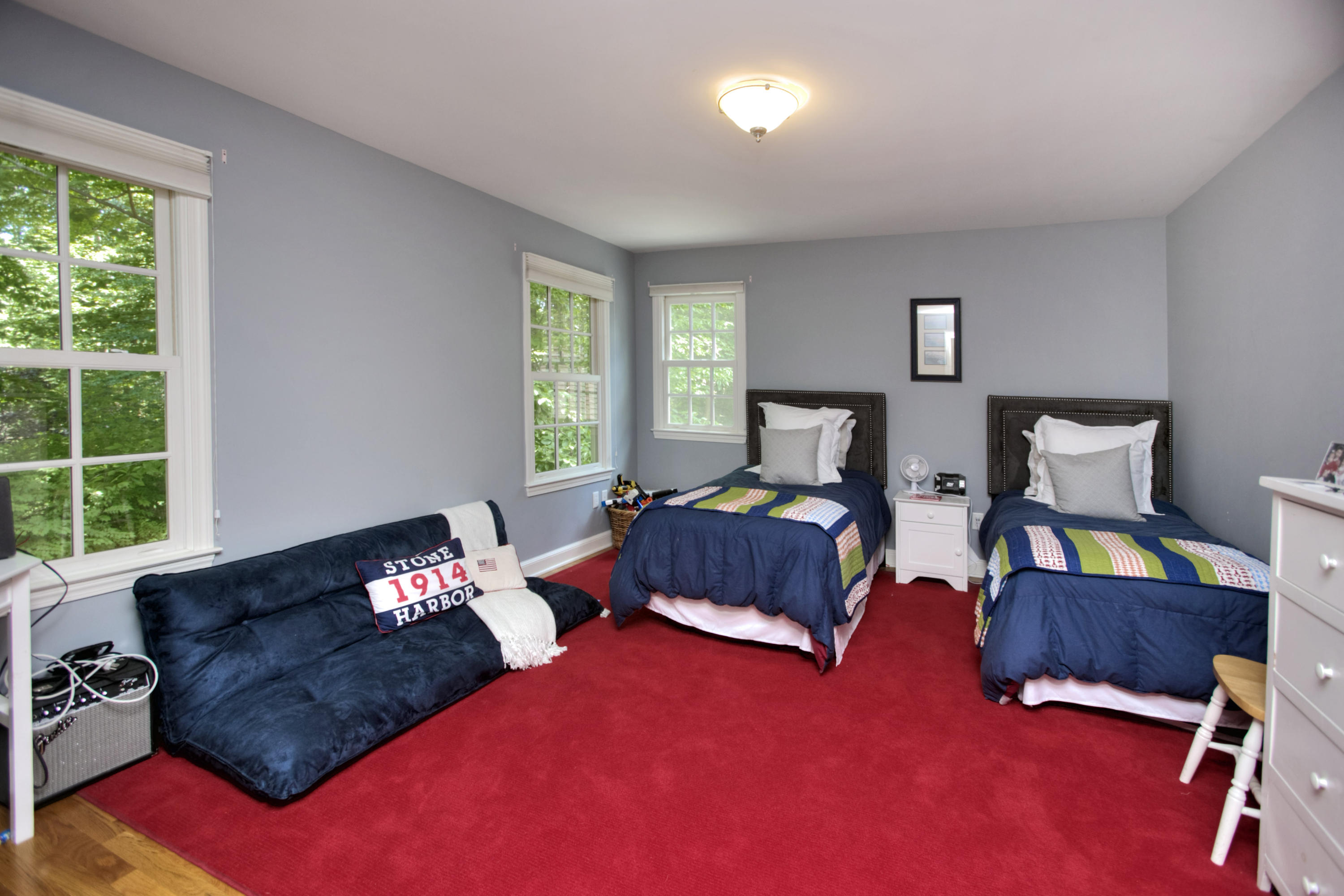 17 Rocaton Road Darien, CT 06820 - Photo 20 of 26 a bedroom with furniture and a large window