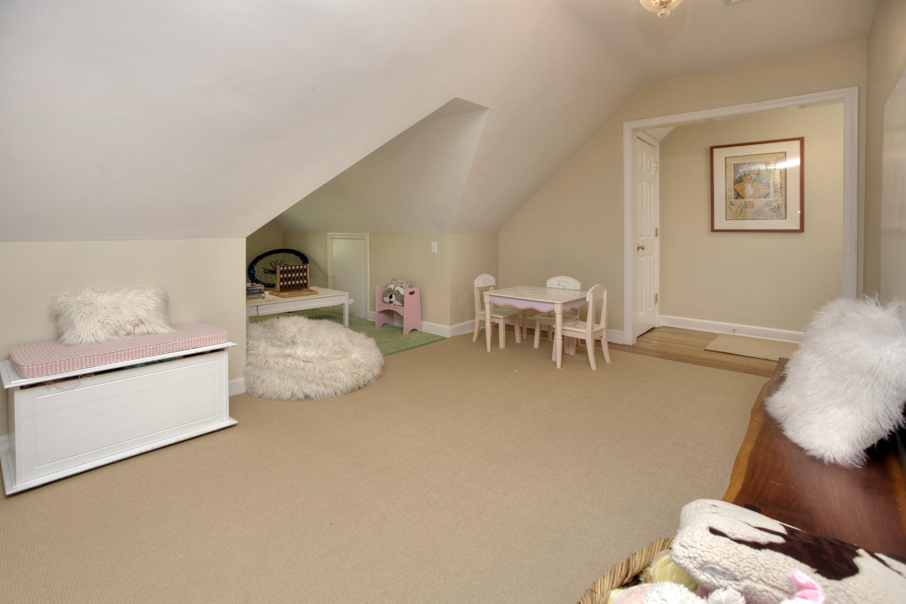 17 Rocaton Road Darien, CT 06820 - Photo 21 of 26 a living room with furniture and a table