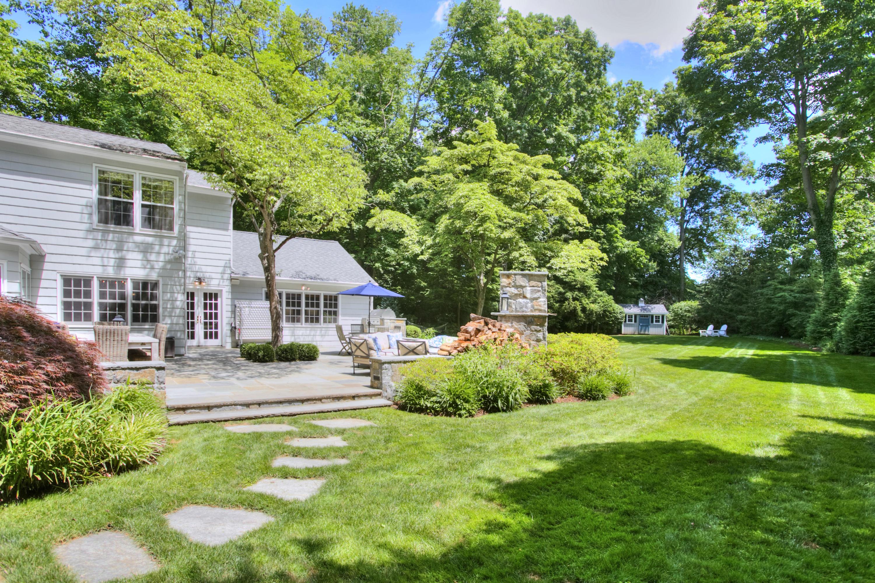 17 Rocaton Road Darien, CT 06820 - Photo 24 of 26 a aerial view of a house with swimming pool and garden