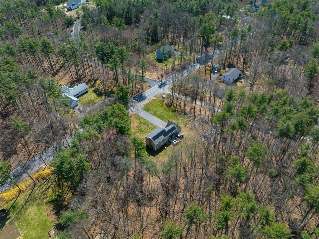 32 Reservoir Road Lunenburg, MA 01462 - Photo 36 of 42 an aerial view of a house with a yard