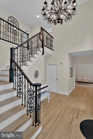 a view of an entryway with wooden floor