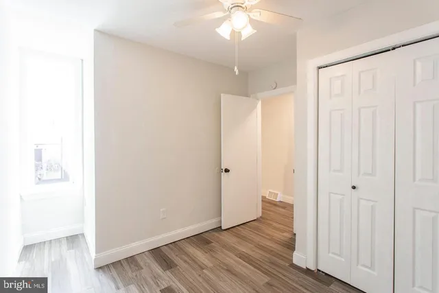 a view of a livingroom with wooden floor