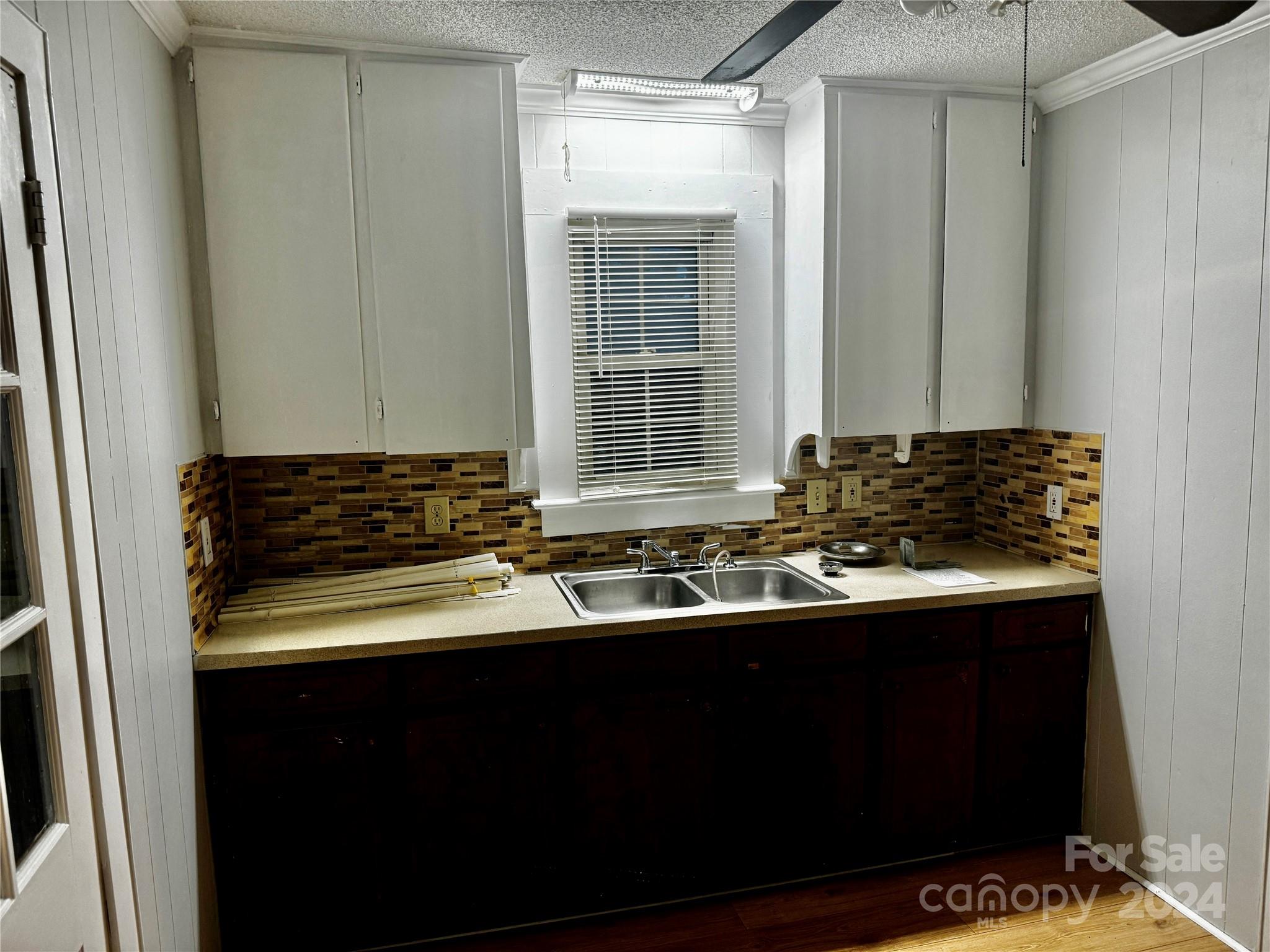 310 Pineview Street Kannapolis, NC 28083 - Photo 11 of 13 a bathroom with a sink and a mirror