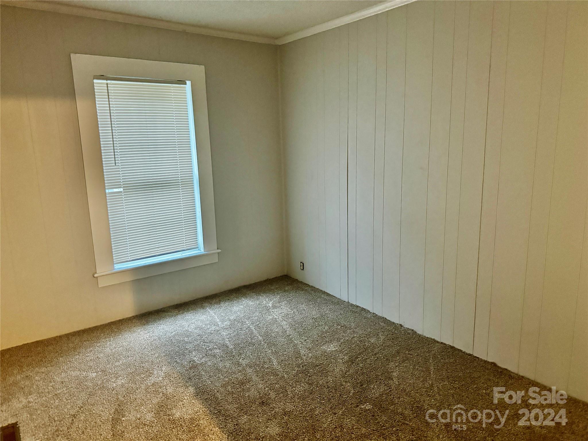 310 Pineview Street Kannapolis, NC 28083 - Photo 7 of 13 a view of an empty room with a window