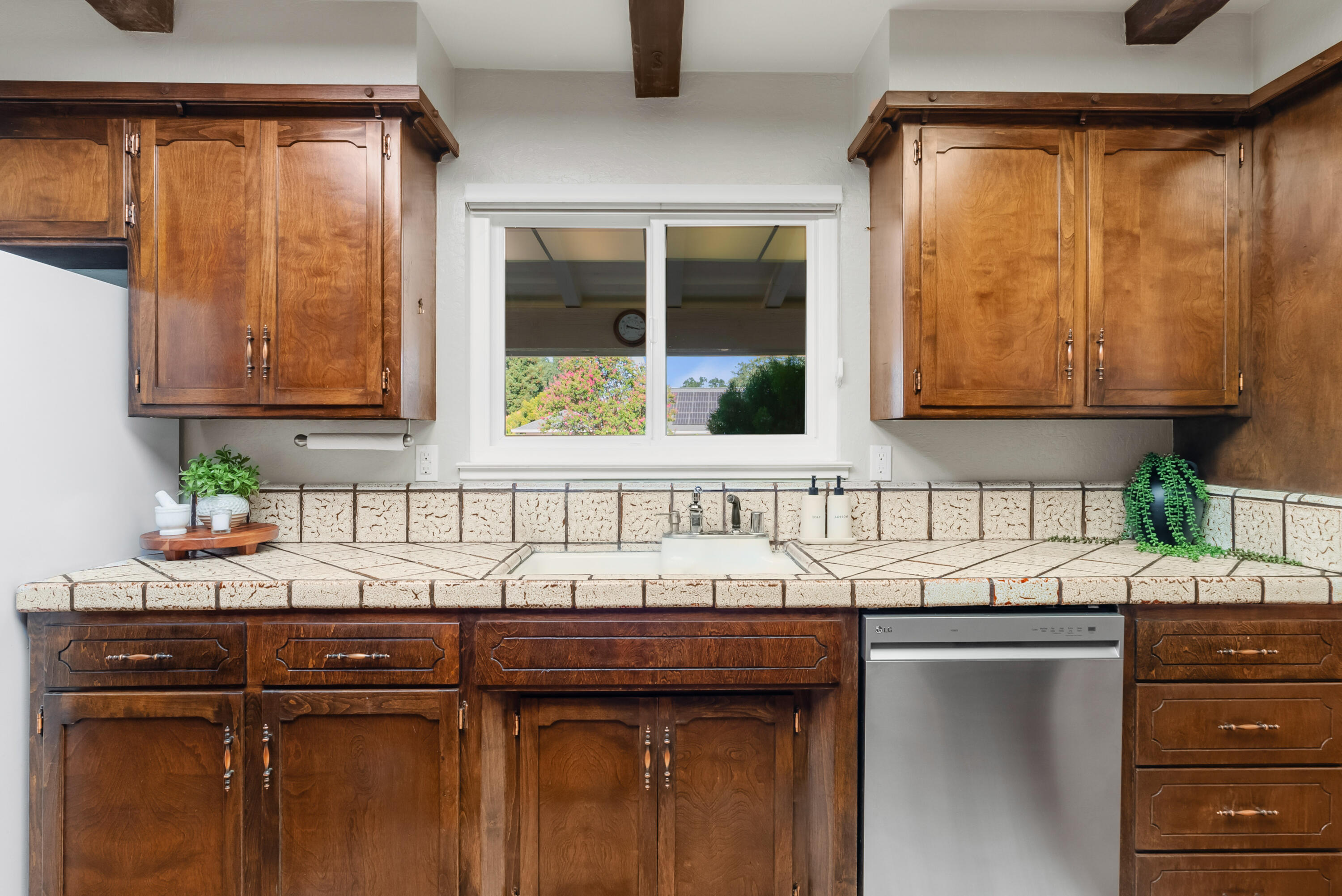 6812 Riata Drive Redding, CA 96002 - Photo 13 of 42 a kitchen with a sink and cabinets