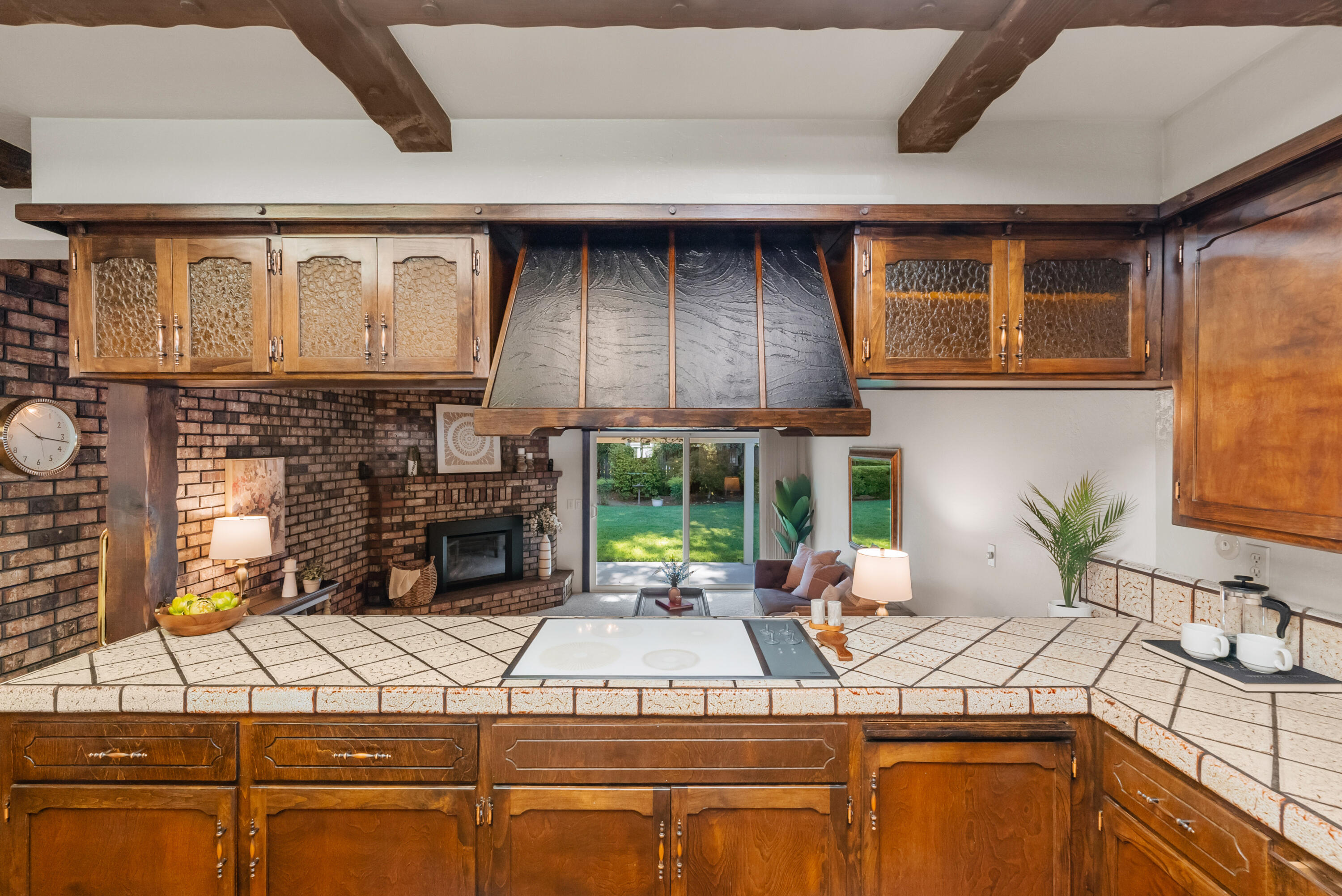 6812 Riata Drive Redding, CA 96002 - Photo 14 of 42 a kitchen with stainless steel appliances granite countertop a sink and a stove