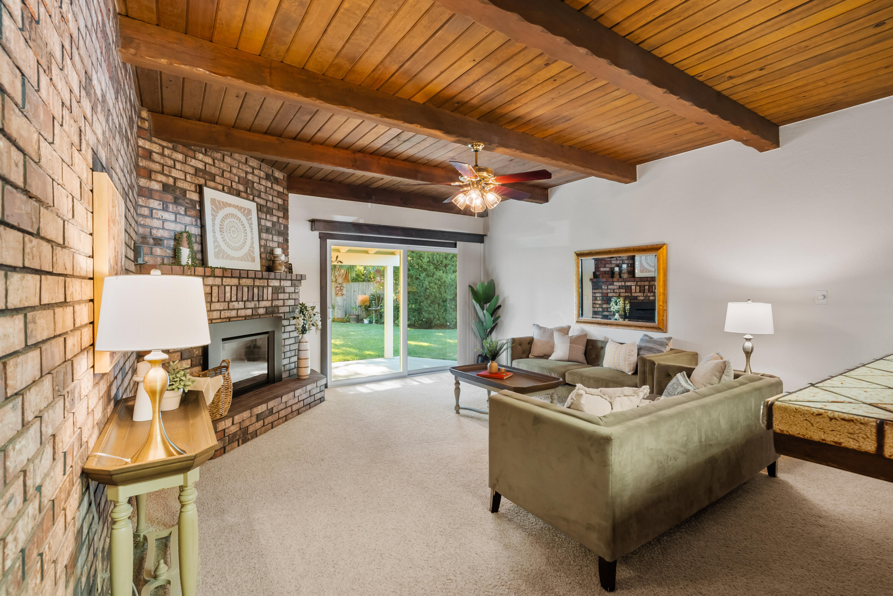6812 Riata Drive Redding, CA 96002 - Photo 15 of 42 a living room with furniture and a large window