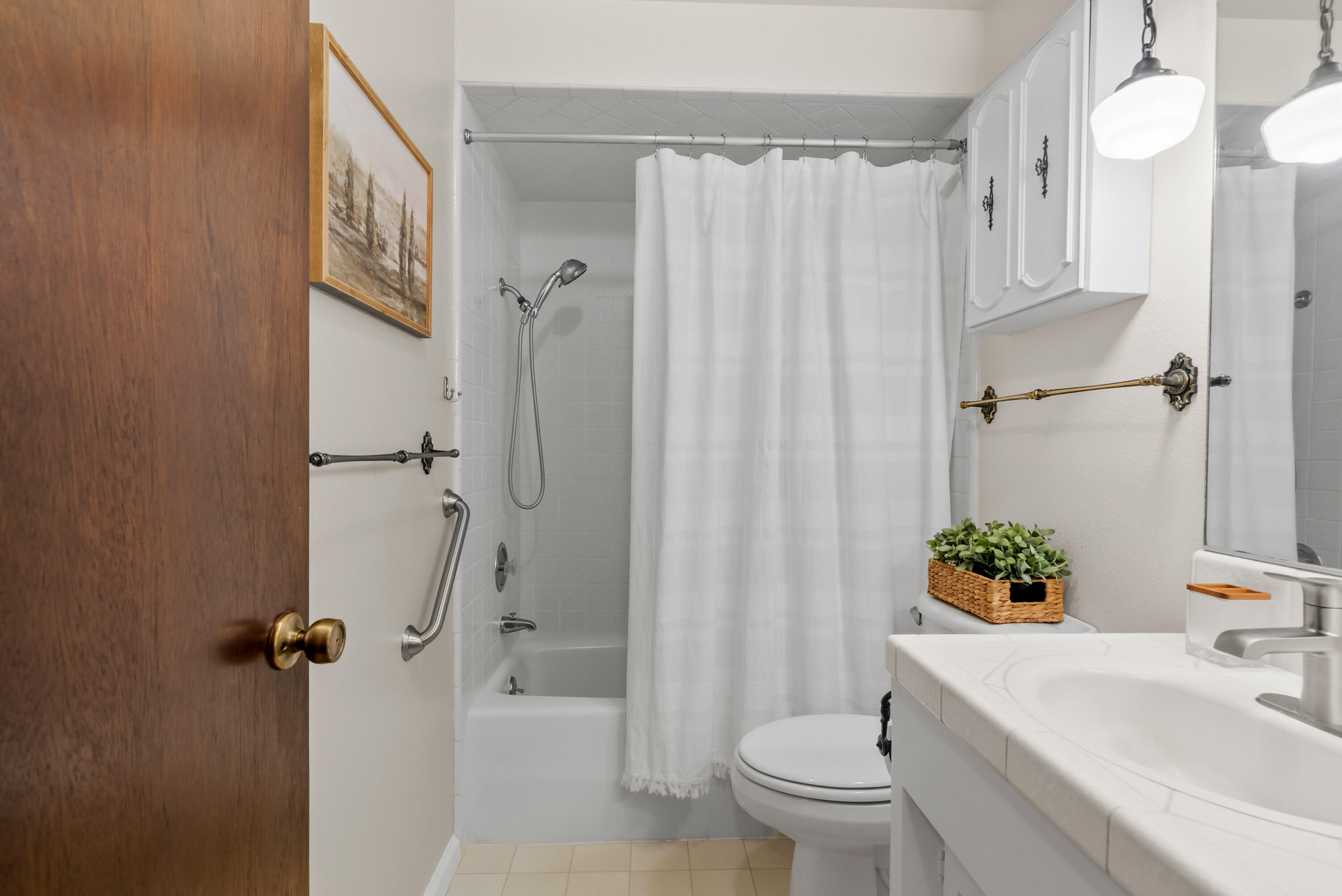 6812 Riata Drive Redding, CA 96002 - Photo 22 of 42 a bathroom with a sink toilet and shower
