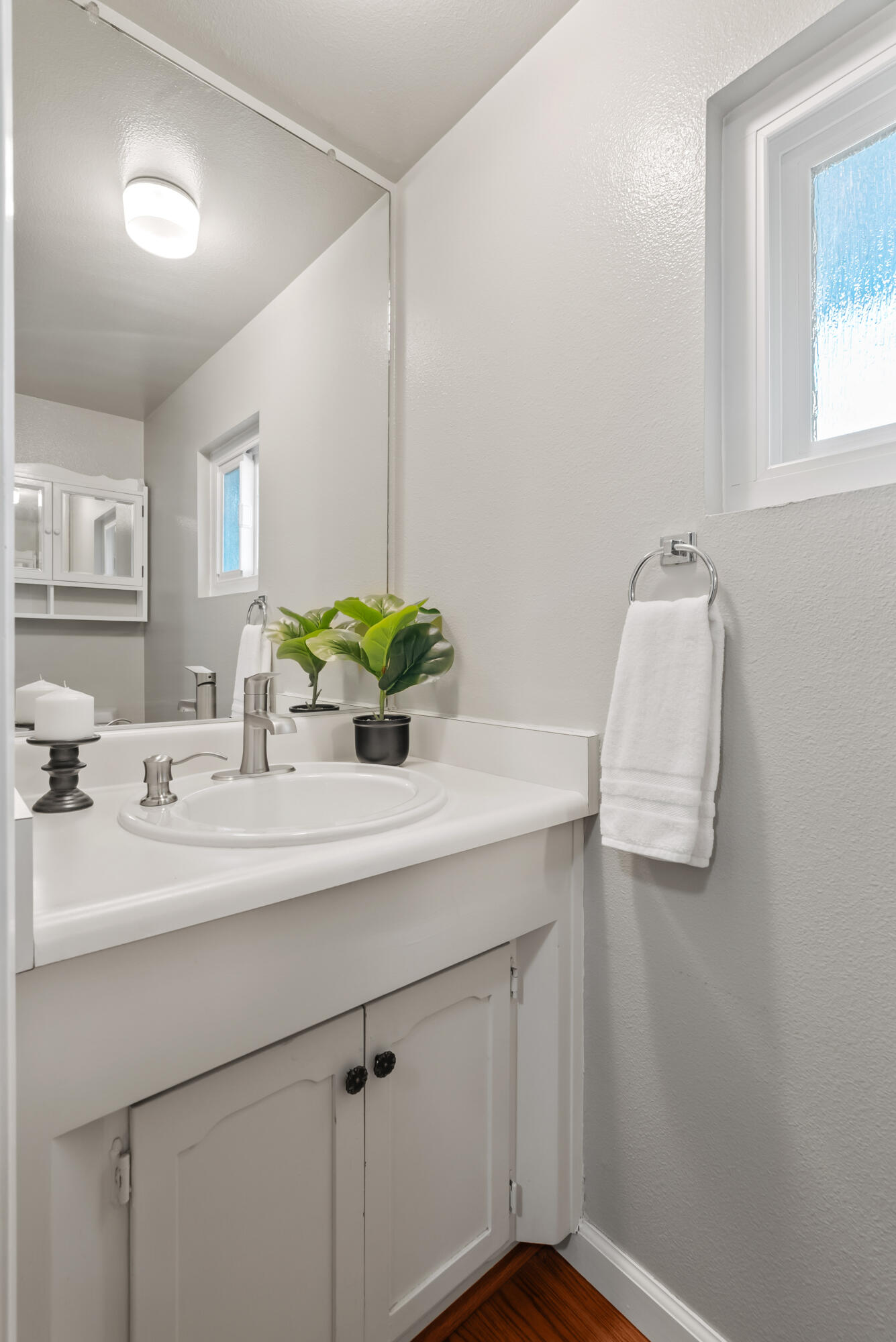 6812 Riata Drive Redding, CA 96002 - Photo 30 of 42 a bathroom with a sink and a mirror