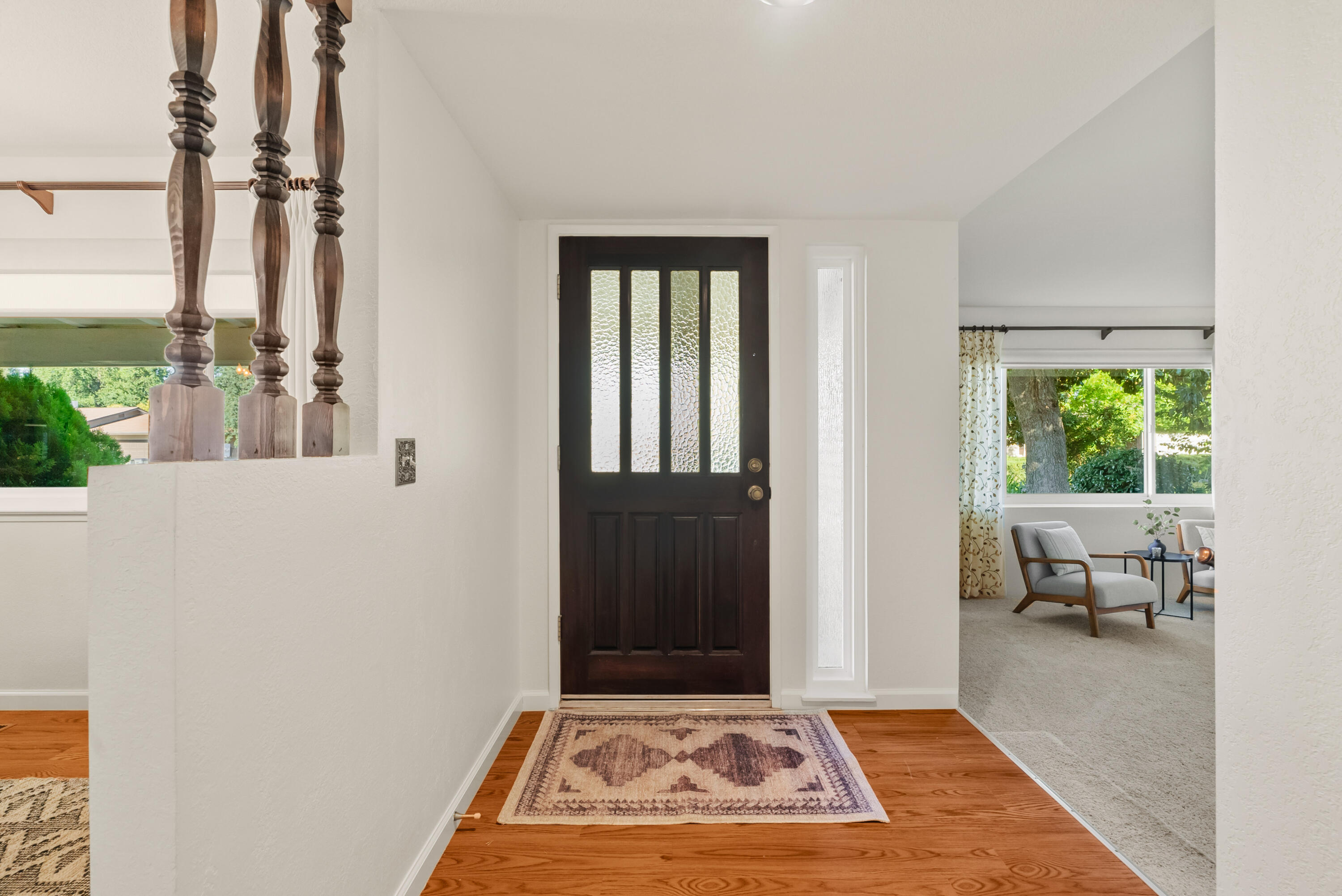 6812 Riata Drive Redding, CA 96002 - Photo 4 of 42 a view of a livingroom with furniture and front door