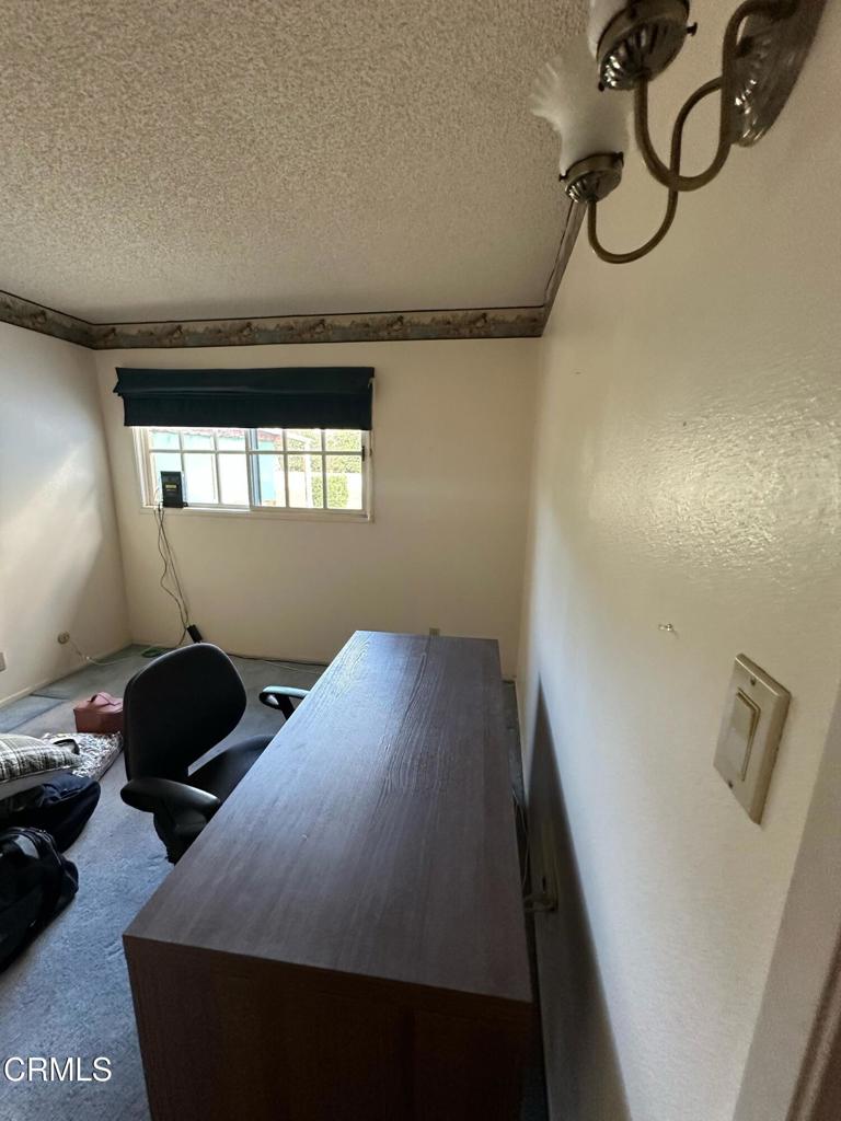 4591 Hempstead Street Simi Valley, CA 93063 - Photo 18 of 47 a bedroom with a bed and window