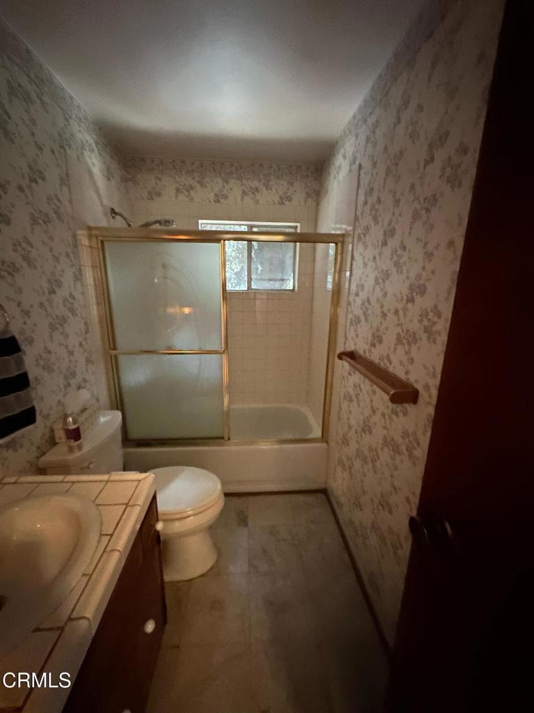 4591 Hempstead Street Simi Valley, CA 93063 - Photo 19 of 47 a bathroom with a toilet and a shower