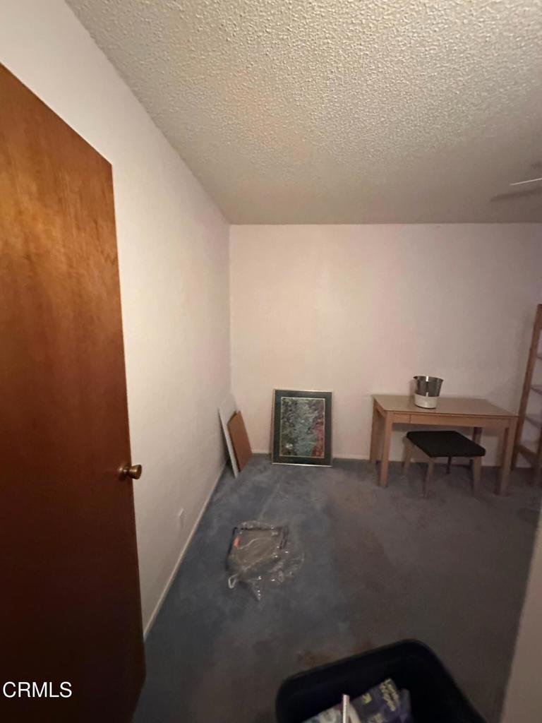 4591 Hempstead Street Simi Valley, CA 93063 - Photo 21 of 47 a living room with furniture and a table