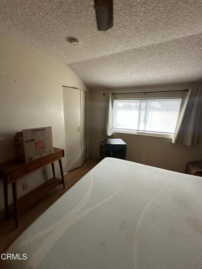 4591 Hempstead Street Simi Valley, CA 93063 - Photo 24 of 47 a bedroom with a bed and a dresser next to it