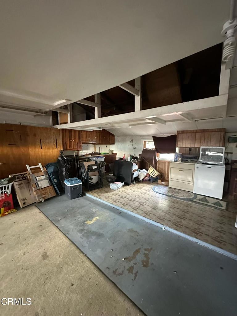 4591 Hempstead Street Simi Valley, CA 93063 - Photo 32 of 47 a living room with furniture and a flat screen tv