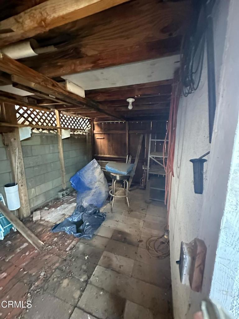4591 Hempstead Street Simi Valley, CA 93063 - Photo 33 of 47 a view of a porch with table and chairs