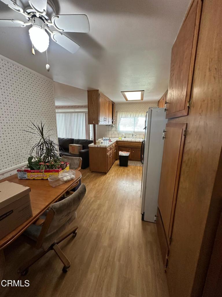 4591 Hempstead Street Simi Valley, CA 93063 - Photo 4 of 47 a living room with furniture a couch and large window