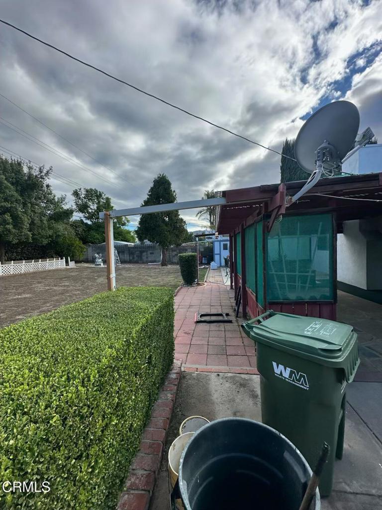 4591 Hempstead Street Simi Valley, CA 93063 - Photo 43 of 47 a view of a back yard of the house and a pathway