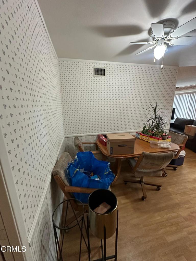 4591 Hempstead Street Simi Valley, CA 93063 - Photo 5 of 47 a living room with furniture and a chandelier