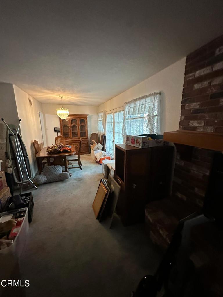 4591 Hempstead Street Simi Valley, CA 93063 - Photo 9 of 47 a room with gym equipment and a large window