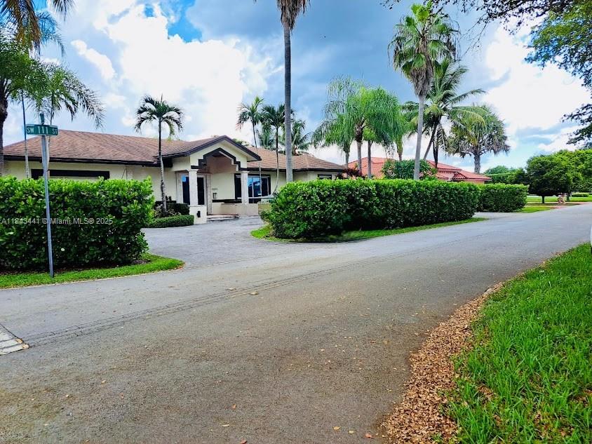 10375 Southwest 111th Street Miami, FL 33176 - Photo 1 of 30 a view of a garden with a house