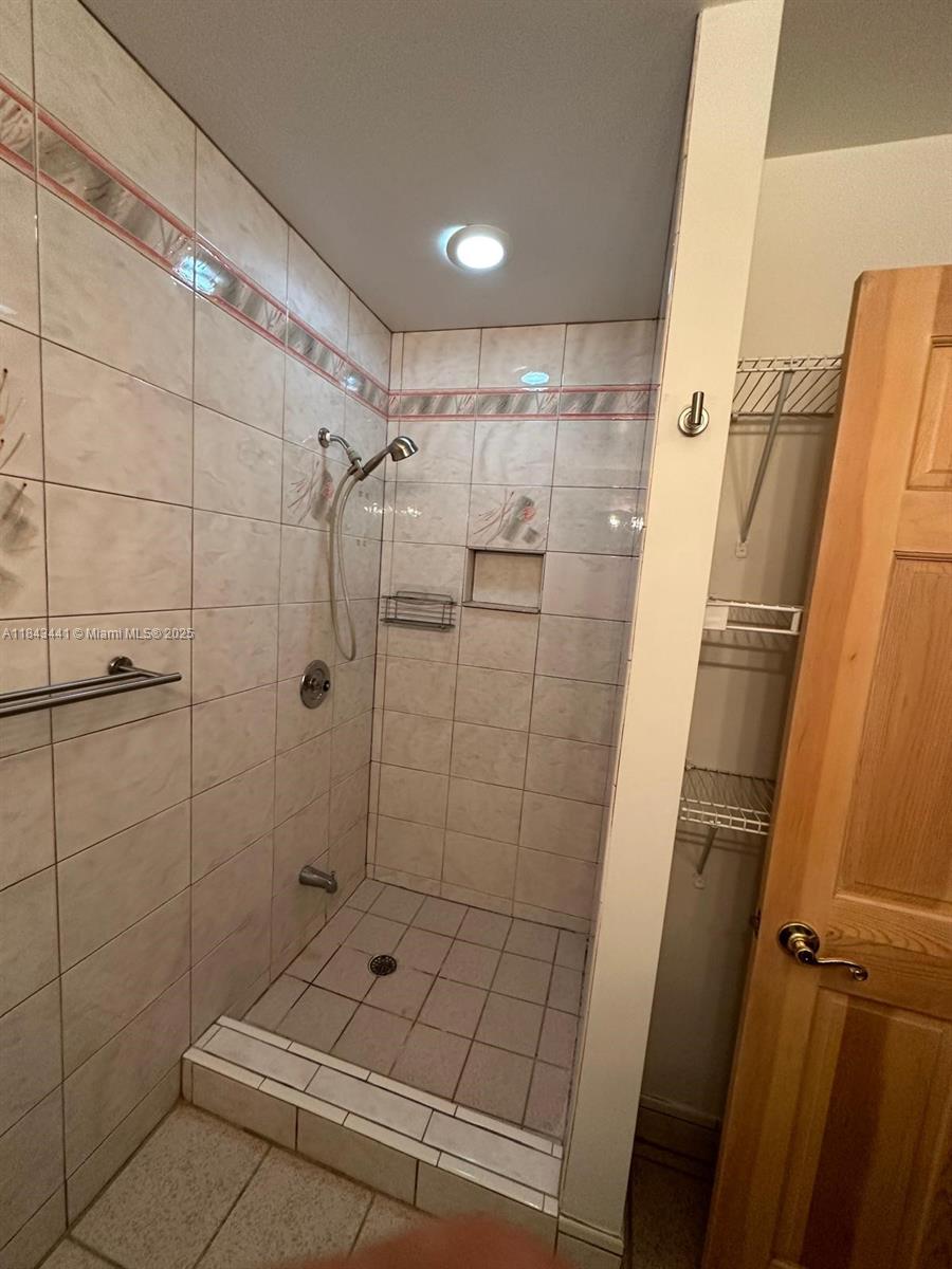 10375 Southwest 111th Street Miami, FL 33176 - Photo 28 of 30 a bathroom with a shower
