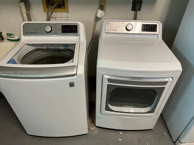 a utility room with dryer and washer
