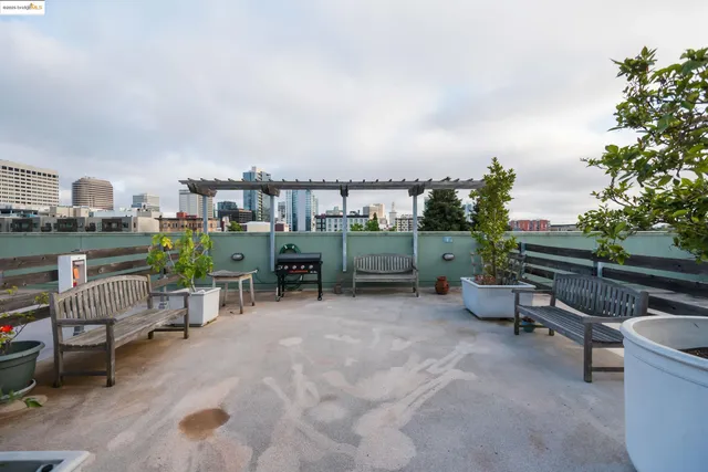 a view of roof deck with seating space