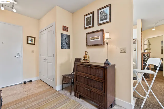 a view of room with furniture and wooden floor