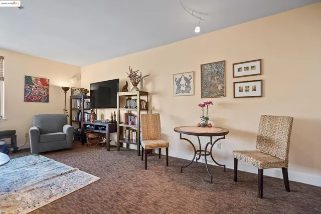 a view of a livingroom with furniture and a couch